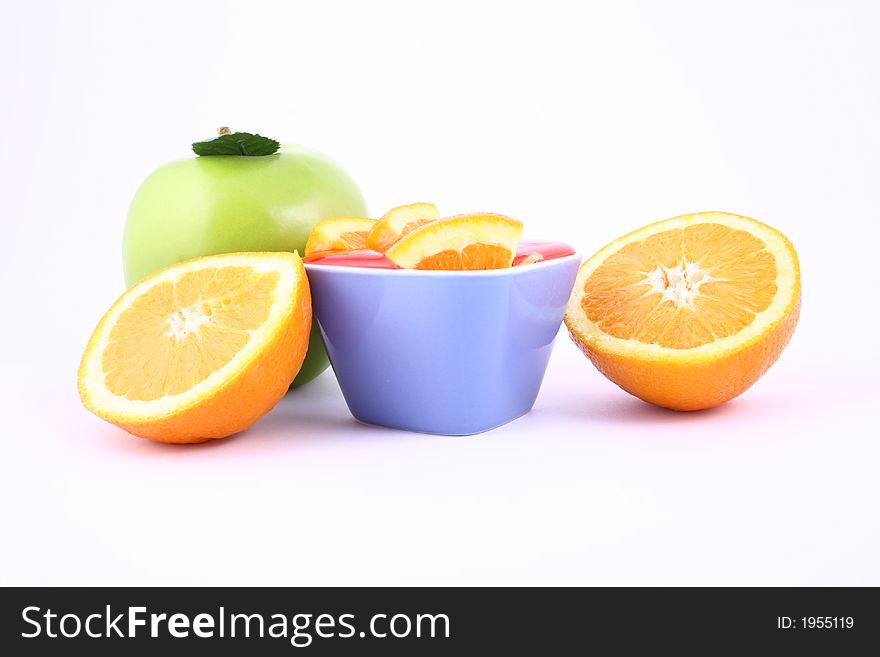 Orange Jelly in a white bowl with silverware. Orange Jelly in a white bowl with silverware.