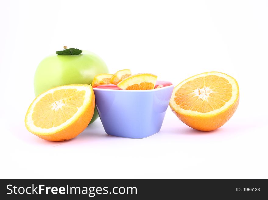 Orange Jelly in a white bowl with silverware. Orange Jelly in a white bowl with silverware.