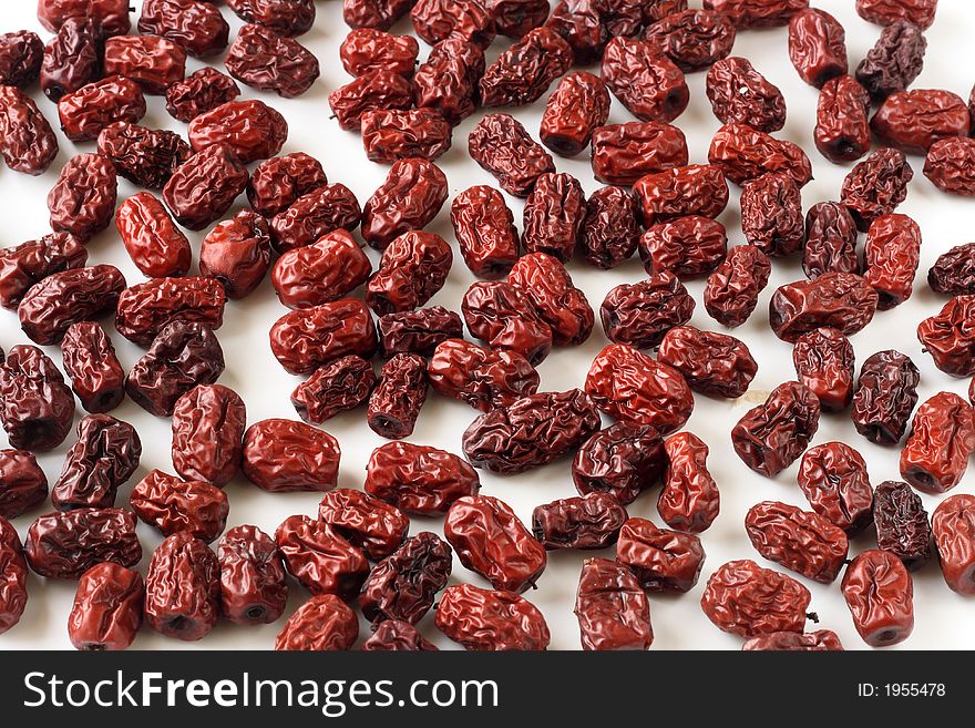 Dried chicken hearts dates on white