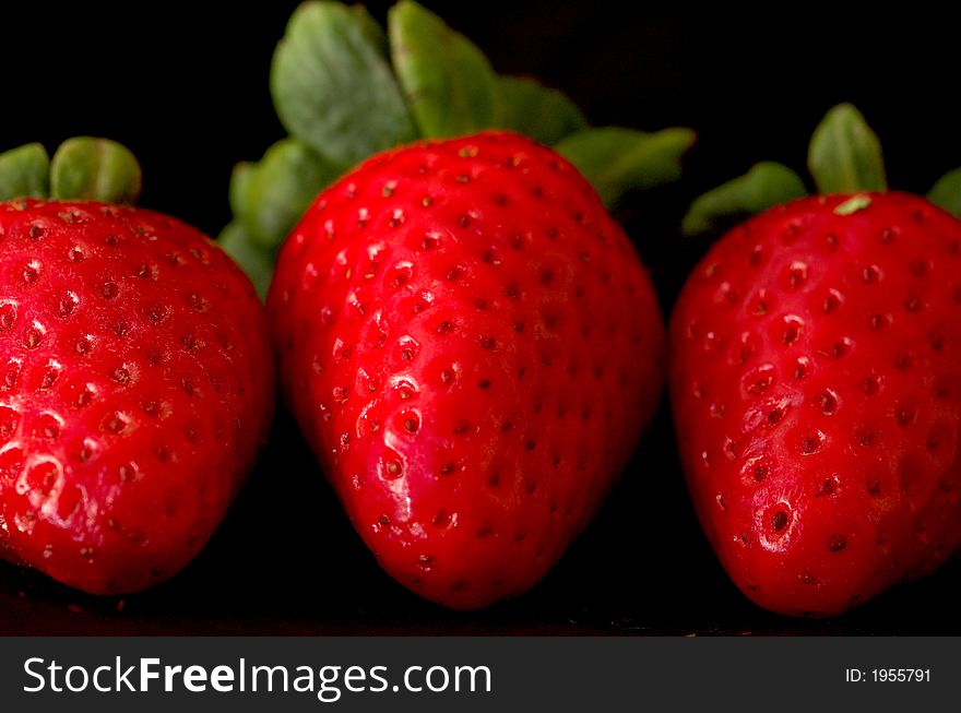 Strawberries Against Black