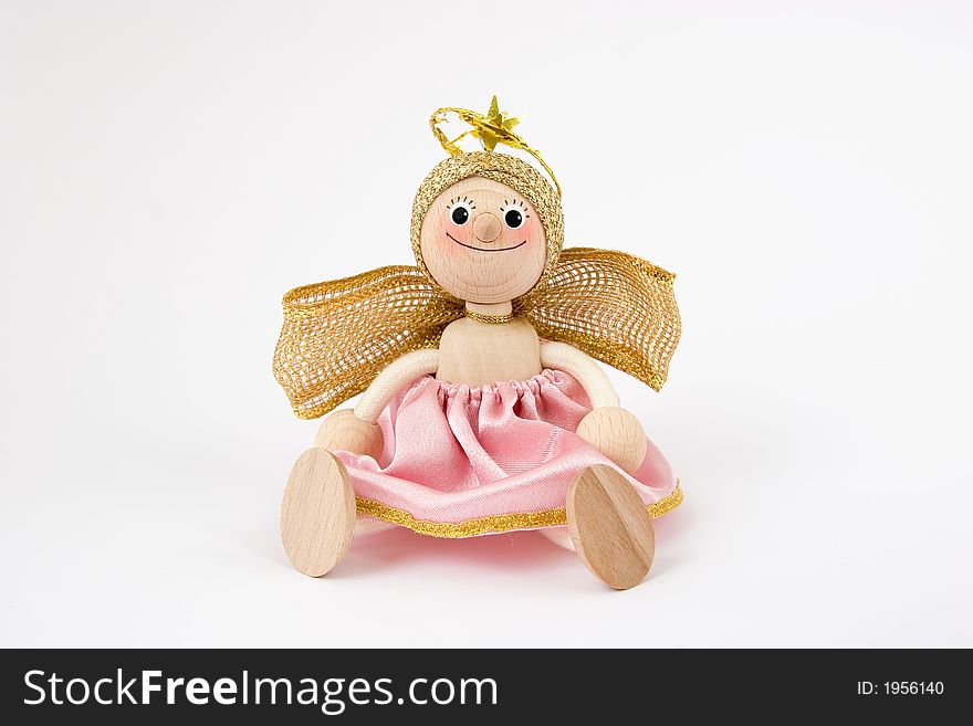 Smiling doll-angel on white background