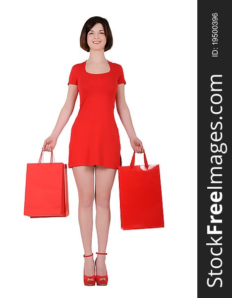 Woman in red with bags, isolated on white