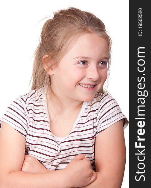 A photograph of a young girl with her arms crossed and a happy smile on her face. A photograph of a young girl with her arms crossed and a happy smile on her face.