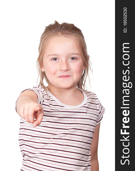 A photograph of a young girl pointing at something with a smirk on her face. A photograph of a young girl pointing at something with a smirk on her face.