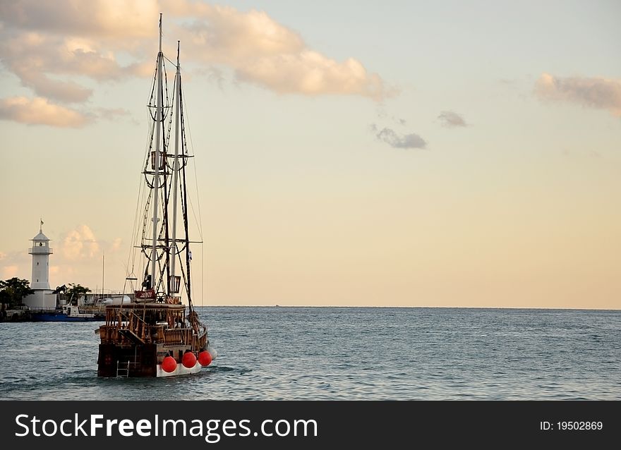 Photo of Sailing boat in the calm summer evening. Photo of Sailing boat in the calm summer evening