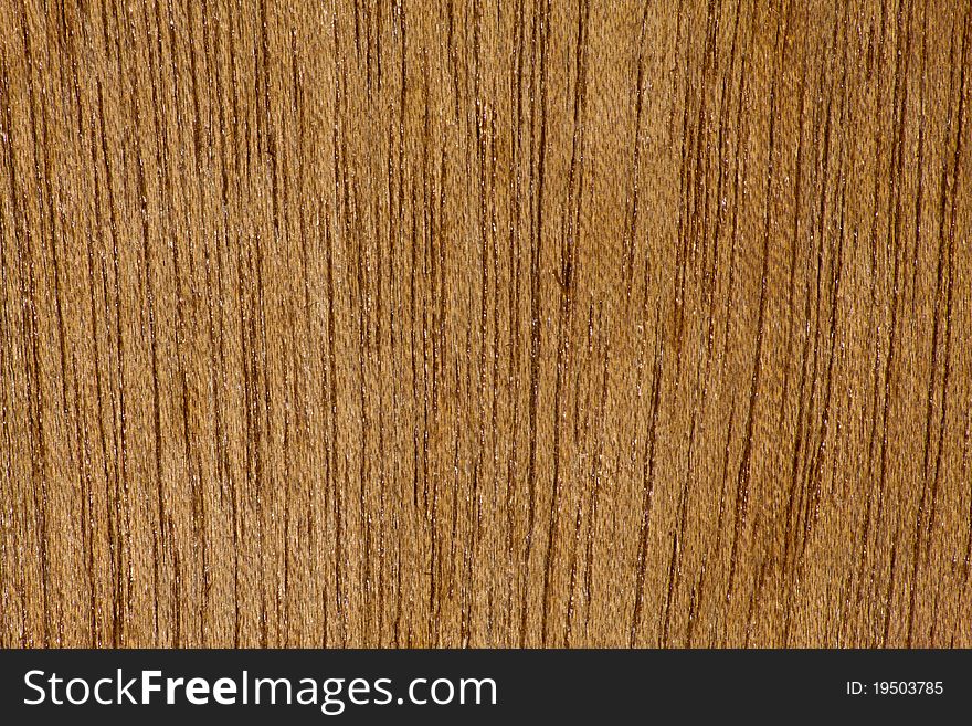 Brown plywood bckground texture stried in vertical. Brown plywood bckground texture stried in vertical