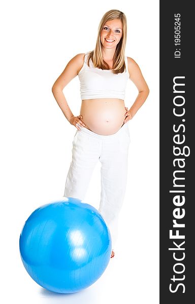 Pregnant woman excercises with gymnastic ball