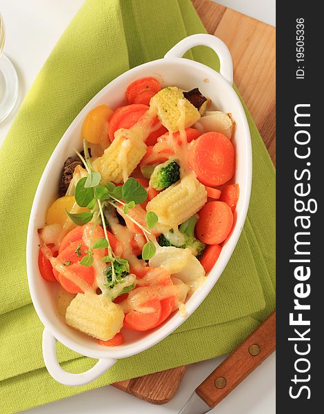 Mixed vegetables in a white porcelain dish