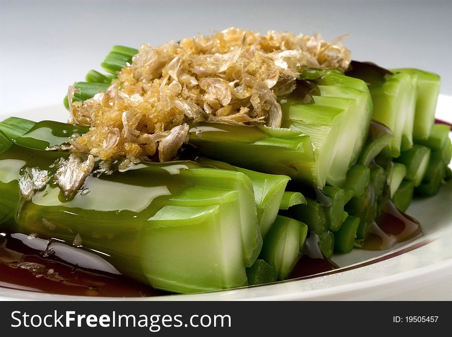 Kale with oyster sauce topped with garlic. Kale with oyster sauce topped with garlic