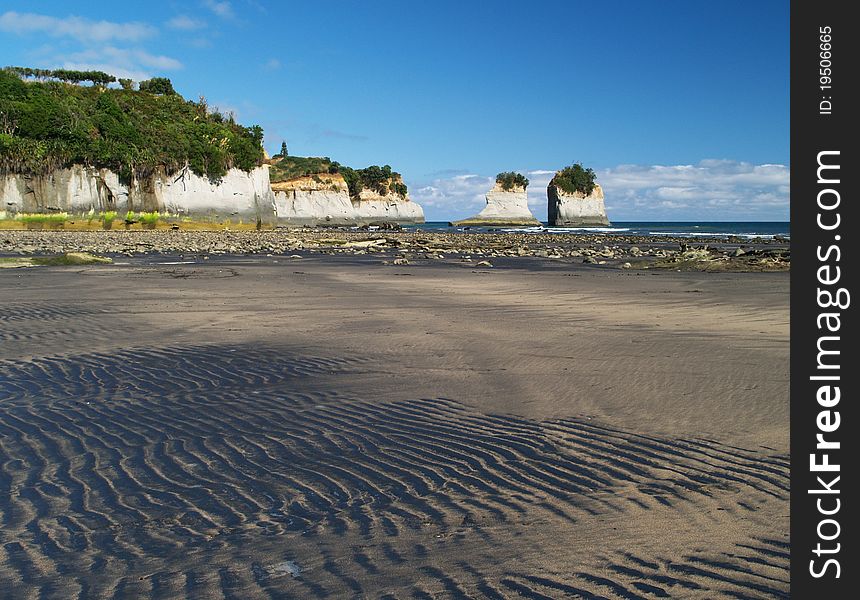 Rock Formation And The Beach