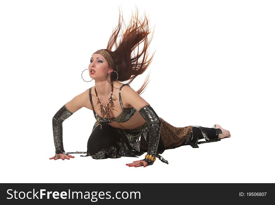 Woman in a snake costume dance in a tribal style. Woman in a snake costume dance in a tribal style