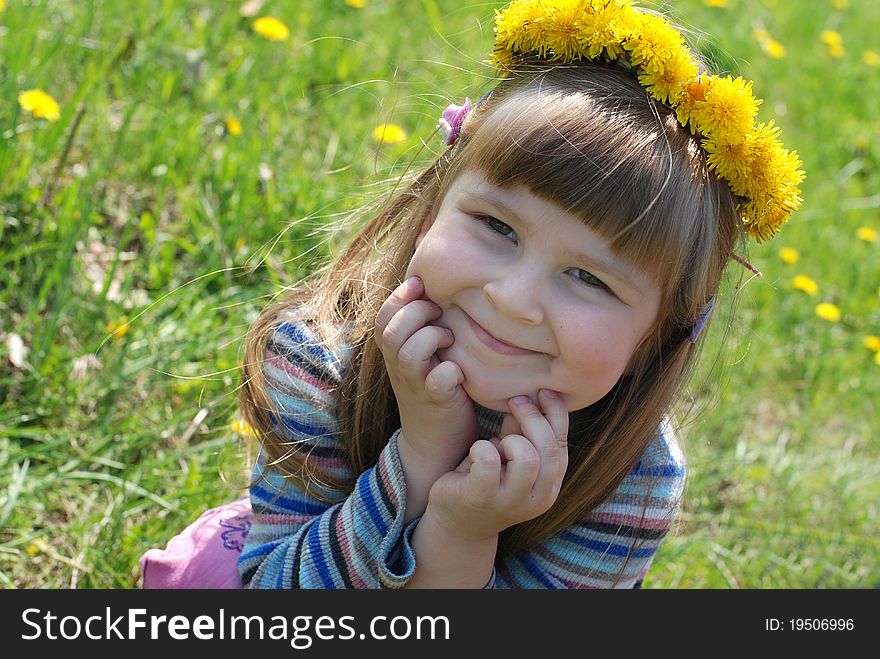 Spring sunny day. Little girl playing outdoors. Spring sunny day. Little girl playing outdoors