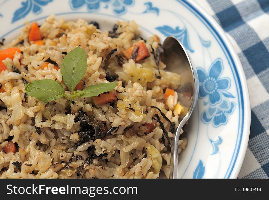 Authentic Oriental style vegetarian fried rice prepared with olive ingredients. Authentic Oriental style vegetarian fried rice prepared with olive ingredients.