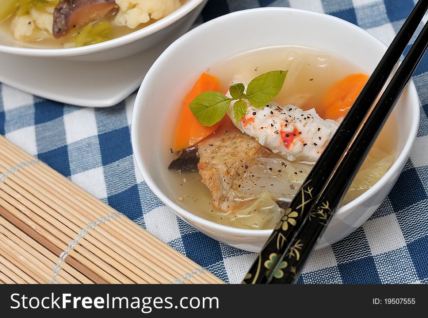 Japanese or Oriental style vegetarian seafood soup with healthy vegetables and prawn. Japanese or Oriental style vegetarian seafood soup with healthy vegetables and prawn.