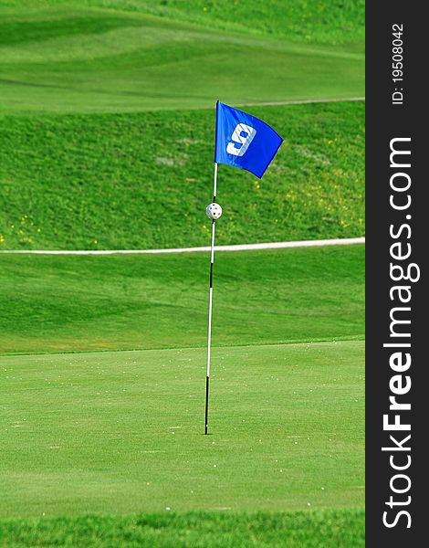 9th flag on the golf course. 9th flag on the golf course