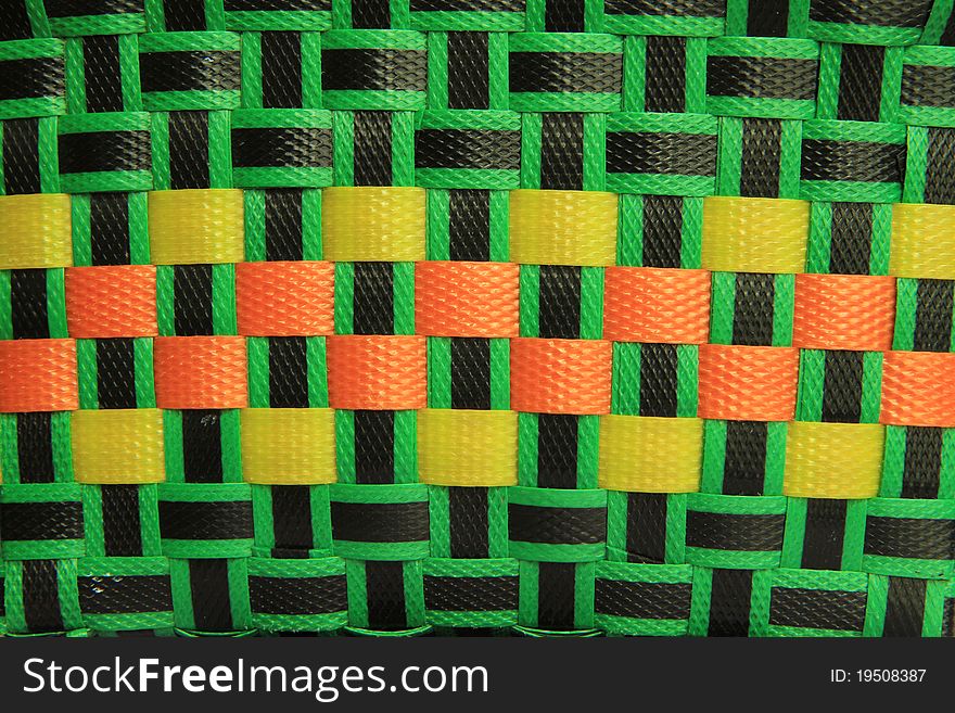 Texture of colorful weaved basket pattern. Texture of colorful weaved basket pattern
