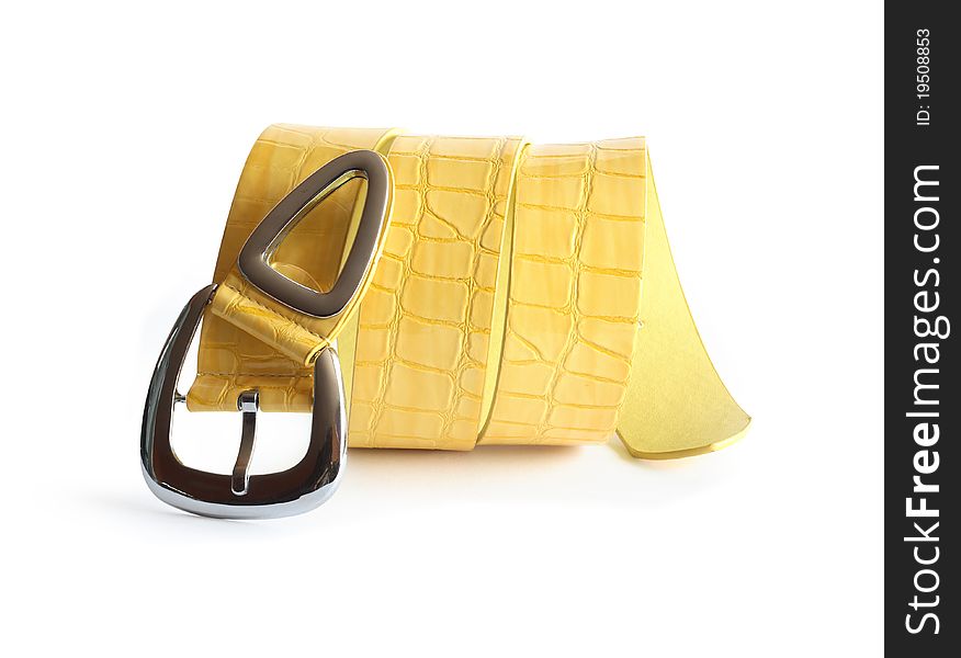 Nice yellow belt with metal buckle on white background. Clipping path is included. Nice yellow belt with metal buckle on white background. Clipping path is included