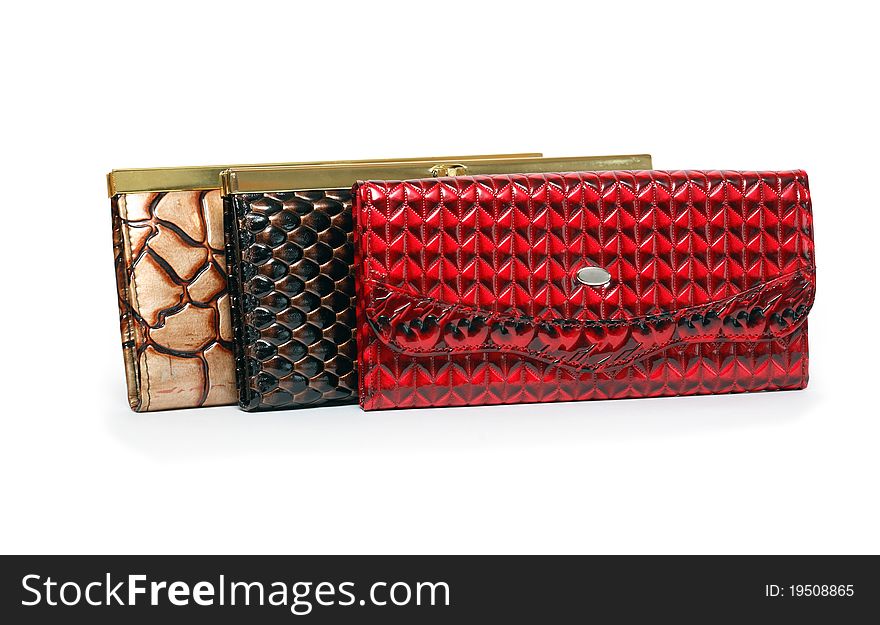 Three nice leather change purses on white background. Clipping path is included. Three nice leather change purses on white background. Clipping path is included