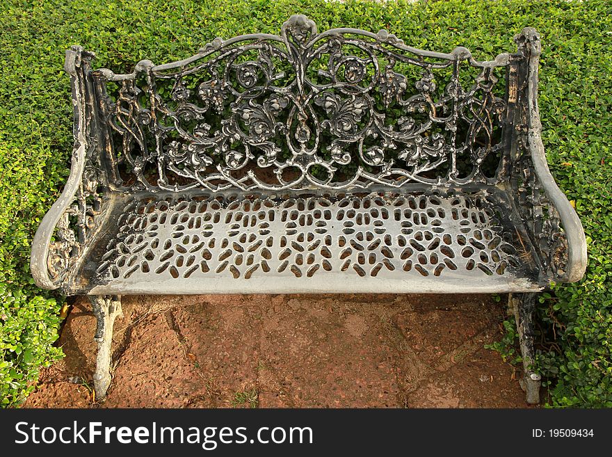 Lonely metal bench in the park