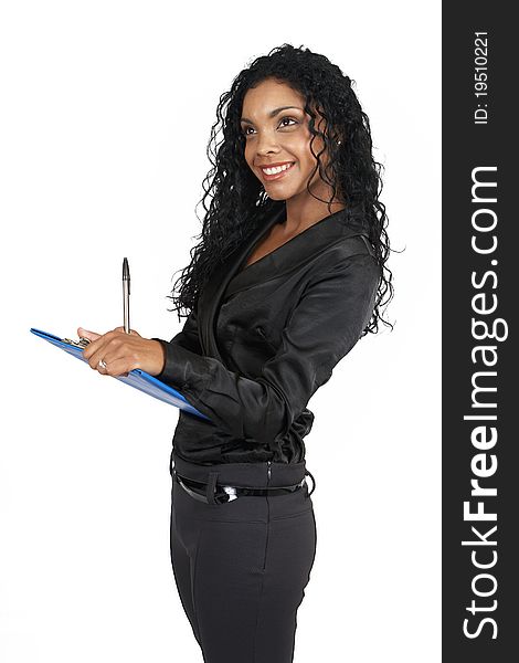 Beautiful brunette businesswoman wearing office clothes holding clipboard and pen in her hands.