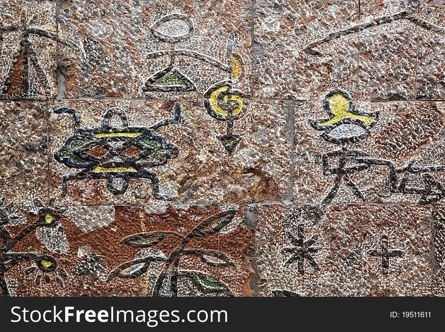 Ancient ba pictograph of the naxi people (a minority ethnic group) as decoration on the wall, lijiang, yunnan, china. Ancient ba pictograph of the naxi people (a minority ethnic group) as decoration on the wall, lijiang, yunnan, china.