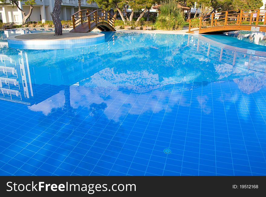 Pool in the open air with transparent blue water