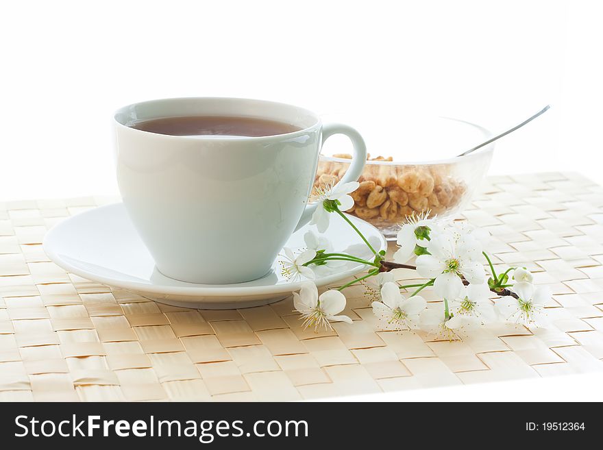 Breakfast with tea and flakes isolated on white background