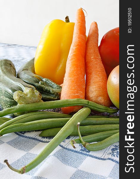 Closeup of raw vegetables on the tablecloth