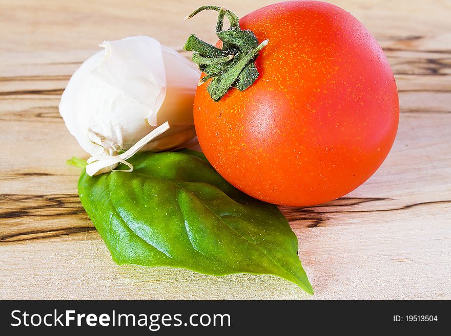 Closeup of tomato, garlic and basil
