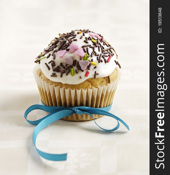 Fresh home made cup cakes decorated with colorful confetti. Fresh home made cup cakes decorated with colorful confetti