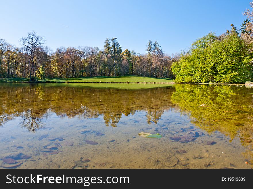 Beautiful pond in the autumn park