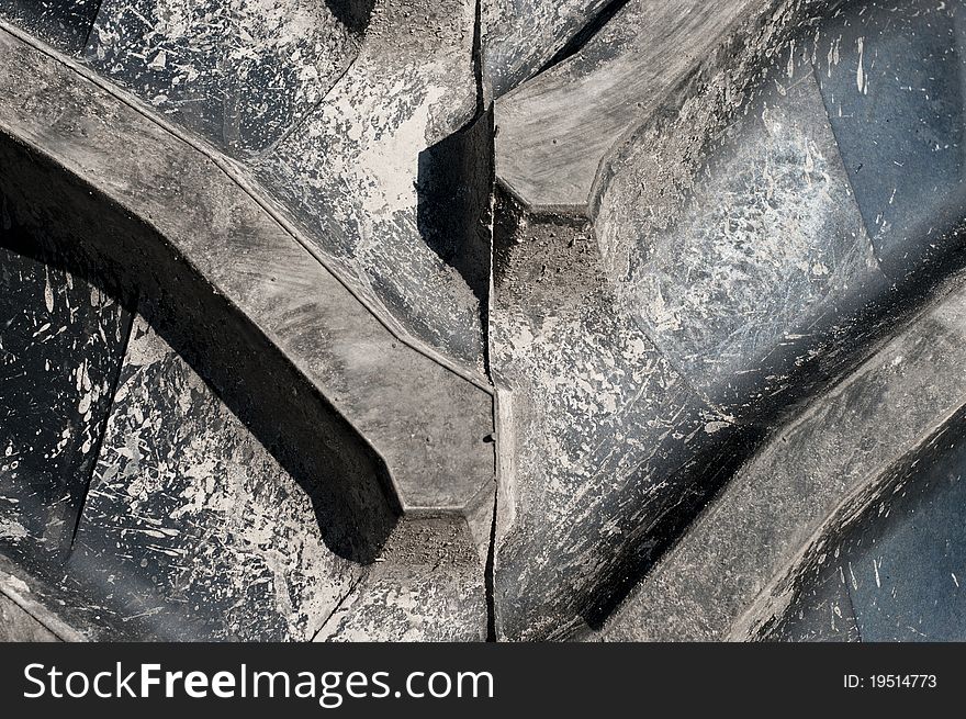 Close-up of a new tractor's rubber tyre. Close-up of a new tractor's rubber tyre.