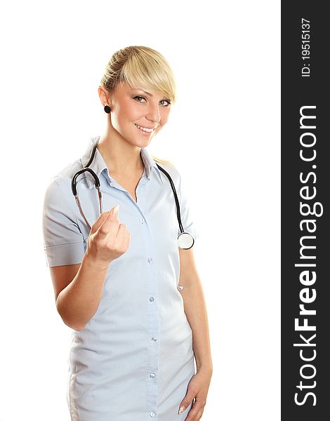 Closeup of an attractive young woman doctor with a smile. Closeup of an attractive young woman doctor with a smile