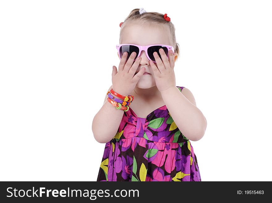 Portrait of a sweet little girl in sunglasses