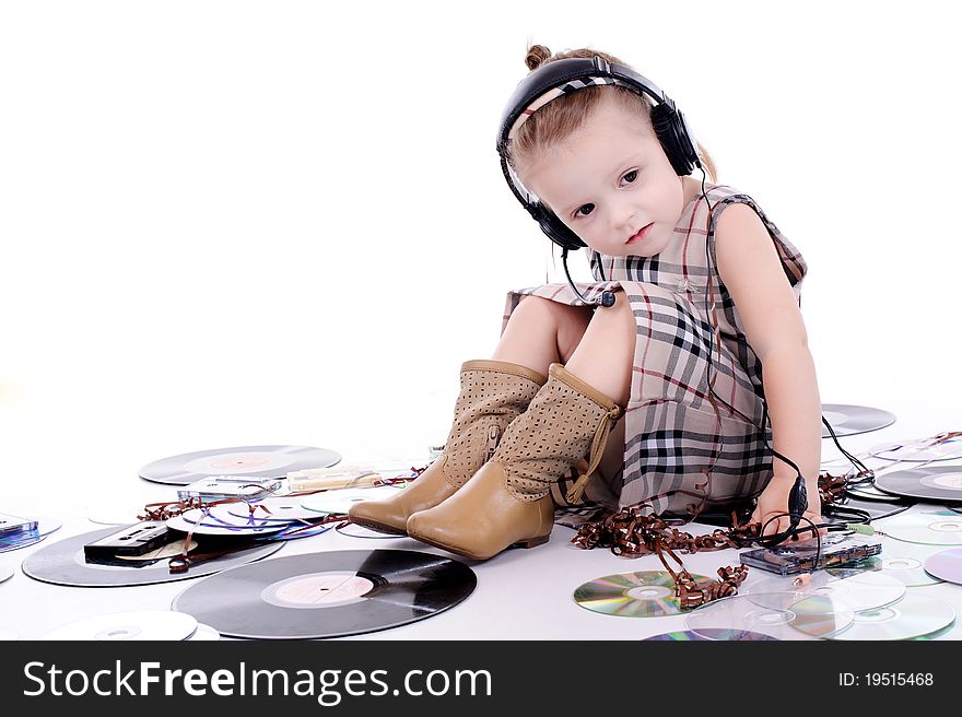 Babe playing with tapes and music records. Babe playing with tapes and music records