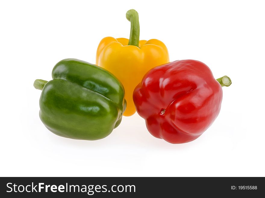 Green,yellow and red paprika isolated on white background. Green,yellow and red paprika isolated on white background