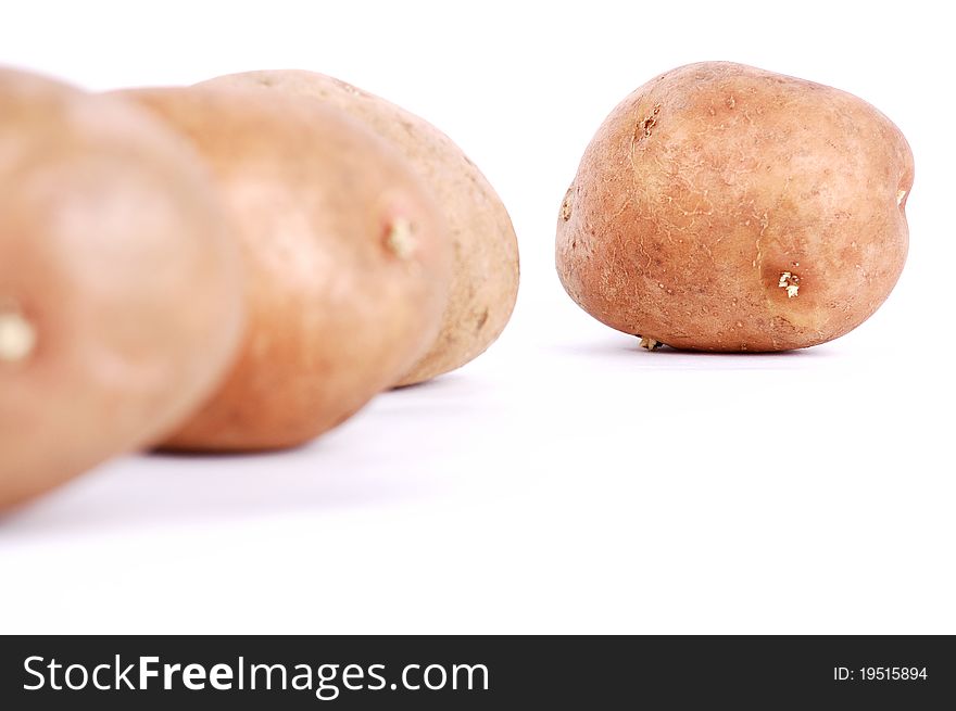 Fresh potato on a white background