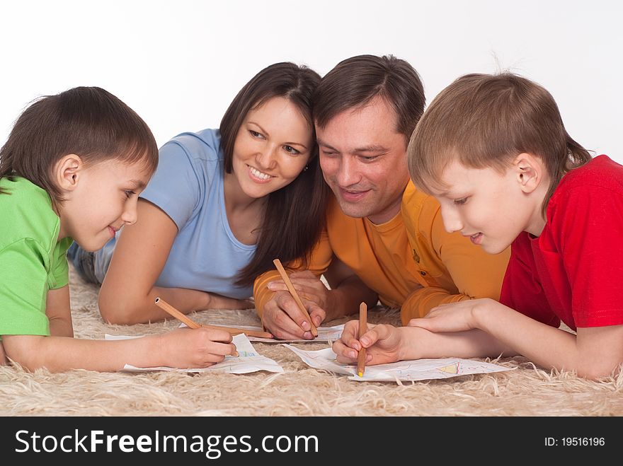 Nice family drawing on a carpet on white