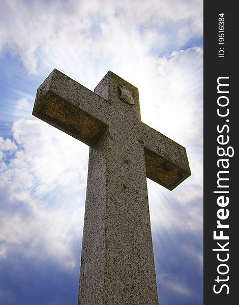 Cross with shine on blue sky background. Cross with shine on blue sky background