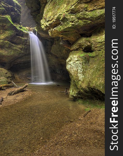 The spring rains bring waterfalls and fresh greens to  Conkle's Hollow in Hocking Hills Ohio. The spring rains bring waterfalls and fresh greens to  Conkle's Hollow in Hocking Hills Ohio.
