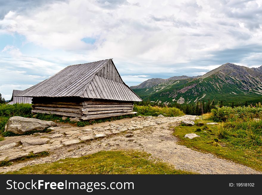 Wooden chalet in high mountain. Wooden chalet in high mountain