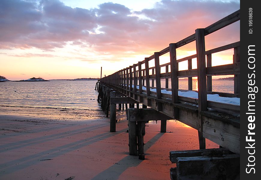 A pier that stretches out into the harbor of Manchester MA. A pier that stretches out into the harbor of Manchester MA