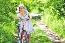 Young Woman With A Vintage Bicycle Royalty Free Stock Images Young Woman With A Vintage Bicycle Royalty Free Stock Images
