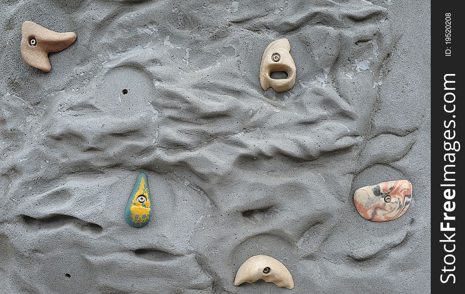 Detail of a climbing wall in a sports facility.