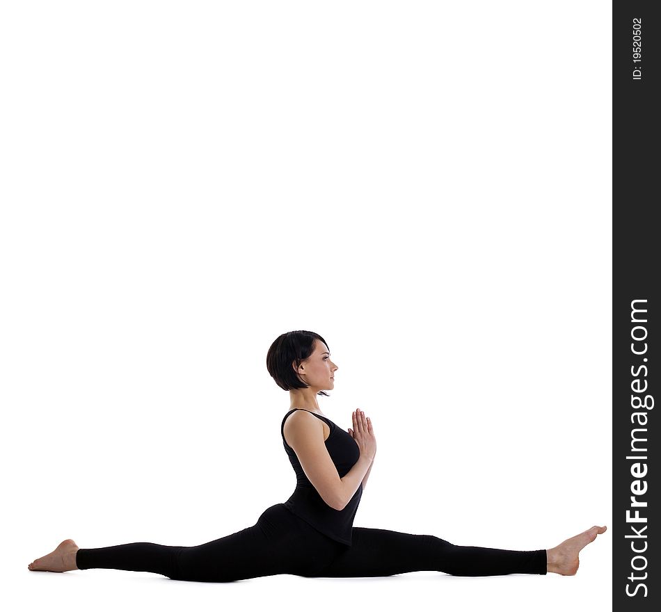 Young woman training in yoga - Hanumanasana pose isolated. Young woman training in yoga - Hanumanasana pose isolated