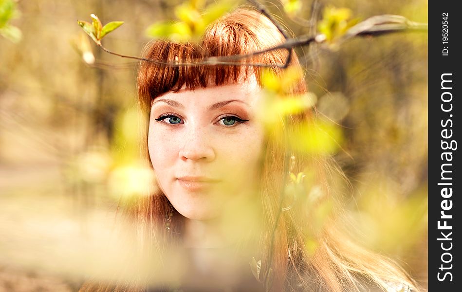 A portrait of a young beautiful woman outdoor