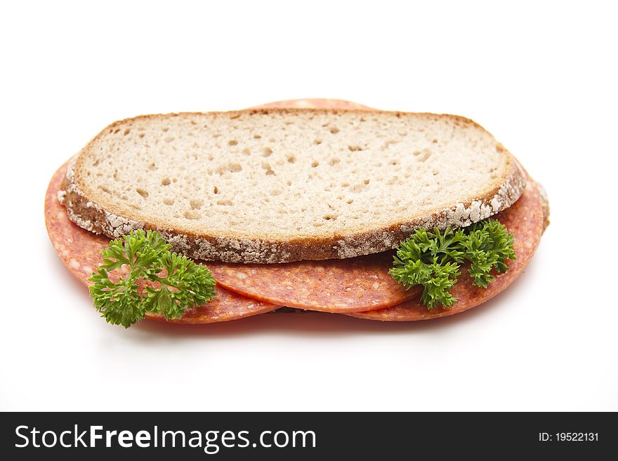 Bread with paprika salami and parsley