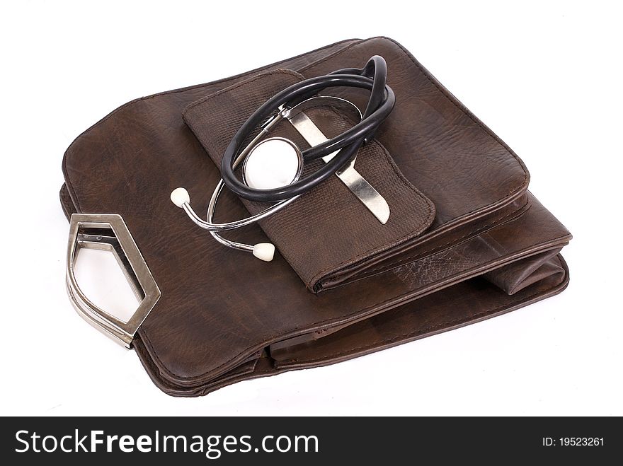 Female bag and a stethoscope,allocated write background. Female bag and a stethoscope,allocated write background.