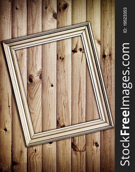 Frame on wooden background