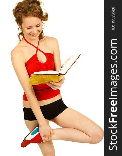 Young girl sportsman reading over white background